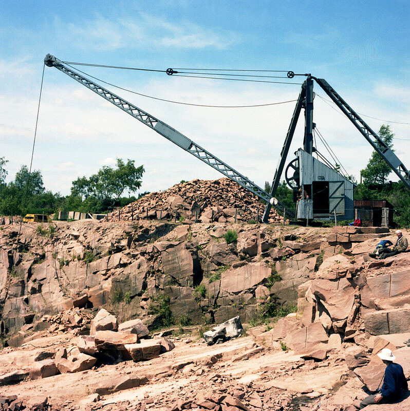 A crane working at the active face of a quarry in the Locharbriggs Cluster, in 1984.